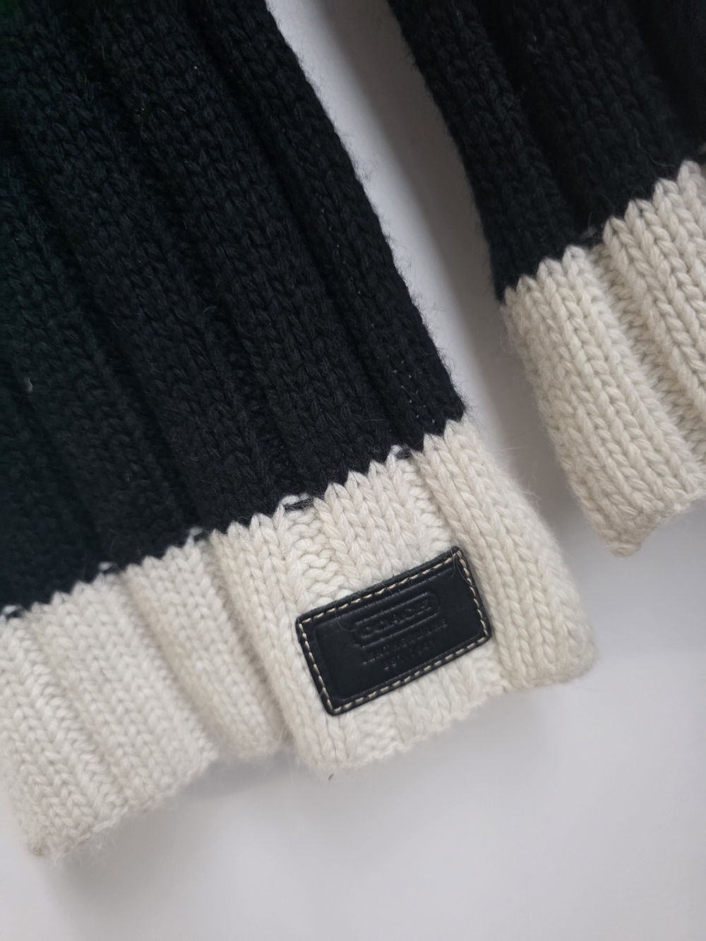 Coach Black and Cream Ribbed Knit Pullover Scarf with Leather Patch